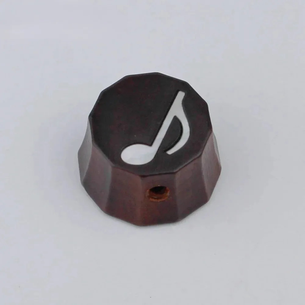 Red sandalwood/ebony potentiometer knob surface, note music mode, bass guitar.